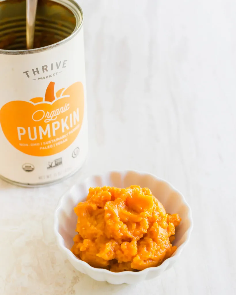 Canned pumpkin puree in a dish.