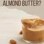Almond butter in a glass with text overlay.