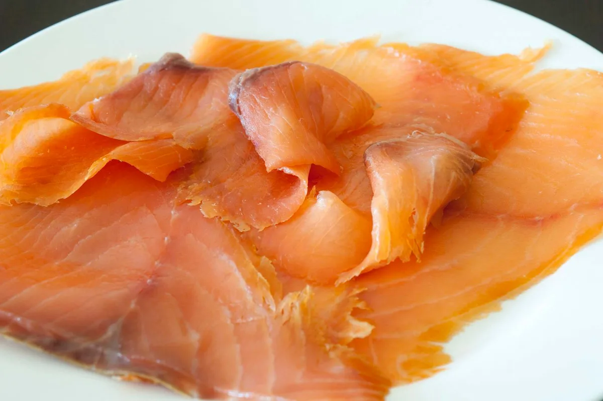Dish of thinly sliced gourmet smoked salmon.