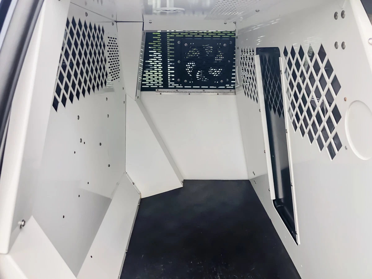 The back kennel area of a K9 police car.