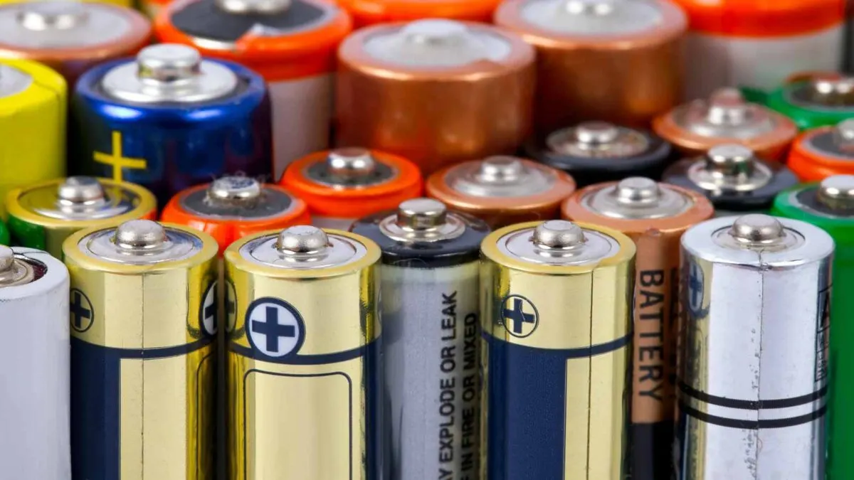 Various types of batteries, showcasing different sizes and brands, arranged closely together.